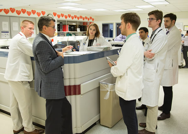 Doctor with bed patient